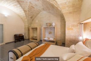 Postel nebo postele na pokoji v ubytování Balbo Suite & Apartment - Lecce Selection