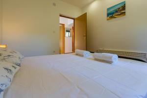Postel nebo postele na pokoji v ubytování VILLA VISA
