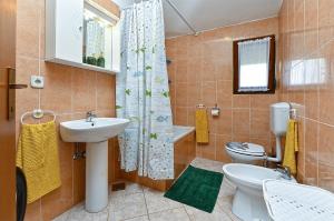 Koupelna v ubytování Apartments Miranda 1858 + 37 fotografií