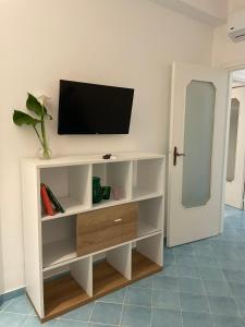 Μια τηλεόραση ή/και κέντρο ψυχαγωγίας στο Tizi Apartments Porto