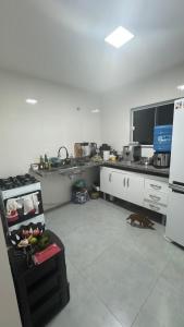 Nhà bếp/bếp nhỏ tại Esquina do Paraíso in Barra Nova