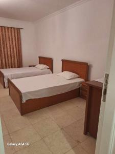 A bed or beds in a room at Marena Hurghada