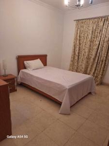 A bed or beds in a room at Marena Hurghada
