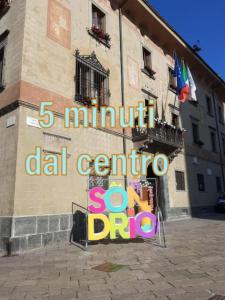 a sign on the side of a building at Villa Luisa Appartamenti Vacanze in Caiolo +27 photos