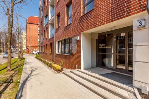 Budova, v ktorej sa apartmán nachádza