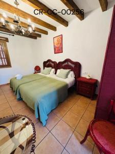 Giường trong phòng chung tại Casa Rural Puerto del Emperador +13 ảnh
