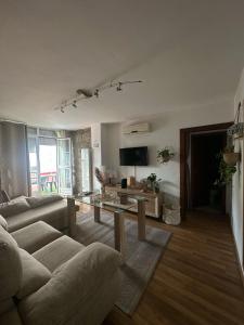 Μια τηλεόραση ή/και κέντρο ψυχαγωγίας στο Apartamento en Huelva.