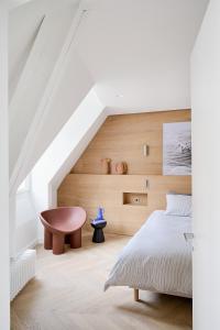 Posteľ alebo postele v izbe v ubytovaní Luxueux duplex en plein coeur de Paris dans le 1er arrondissement