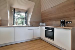 Kuchyň nebo kuchyňský kout v ubytování Pierre 23 - A 200m de la plage parking privé