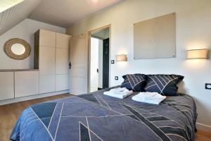 Postel nebo postele na pokoji v ubytování Pierre 23 - A 200m de la plage parking privé