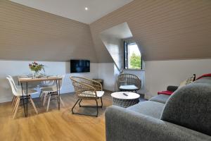 TV a/nebo společenská místnost v ubytování Pierre 23 - A 200m de la plage parking privé