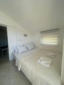 Postel nebo postele na pokoji v ubytování Al Mare Vacation Home