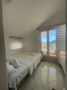 Postel nebo postele na pokoji v ubytování Al Mare Vacation Home