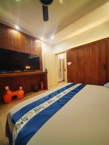 枕窗听雨Homestay客房内的一张或多张床位