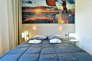 Postel nebo postele na pokoji v ubytování Gérard 2 - A 200 m de la plage