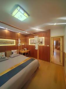 枕窗听雨Homestay客房内的一张或多张床位