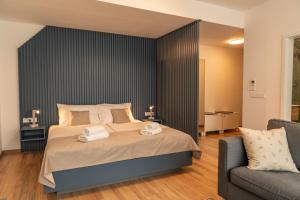 Posteľ alebo postele v izbe v ubytovaní P23 Apartments
