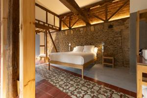 Postel nebo postele na pokoji v ubytování Hotel Carlos V