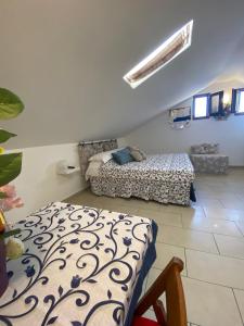 Postel nebo postele na pokoji v ubytování B&B FRAI