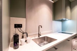Kuchyňa alebo kuchynka v ubytovaní Aparthotel Atenea Calabria