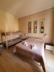 Letto o letti in una camera di 4Rooms Guest House Free Wi-Fi