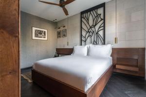 Ένα ή περισσότερα κρεβάτια σε δωμάτιο στο Ramban Hotel Jerusalem