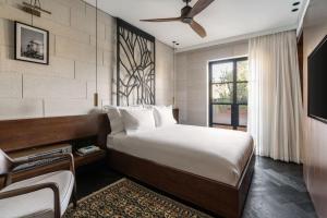 Ένα ή περισσότερα κρεβάτια σε δωμάτιο στο Ramban Hotel Jerusalem