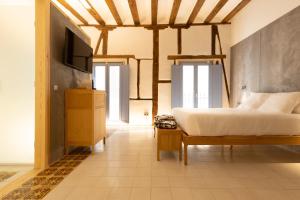 TV a/nebo společenská místnost v ubytování Hotel Carlos V