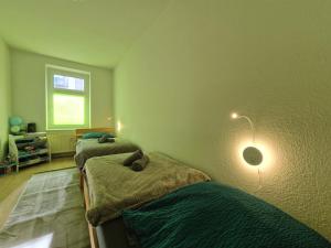 Postel nebo postele na pokoji v ubytování HappySide Travel&Work #1 o WLAN o 6 Einzelbetten