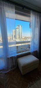 Ένα ή περισσότερα κρεβάτια σε δωμάτιο στο Home away from home