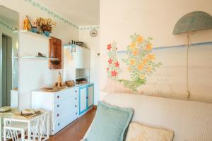 Køkken eller tekøkken på Cala Granu Vista Mare Private Parking and Pool