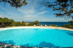 Swimmingpoolen hos eller tæt på Cala Granu Vista Mare Private Parking and Pool