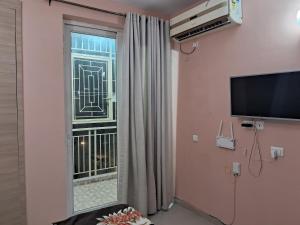 TV a/nebo společenská místnost v ubytování Shushila home stay