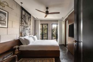 Ένα ή περισσότερα κρεβάτια σε δωμάτιο στο Ramban Hotel Jerusalem