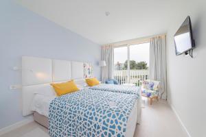 Postel nebo postele na pokoji v ubytování Amadria Park Family Hotel Jakov