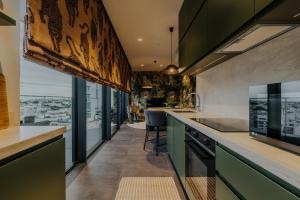 Kuchyň nebo kuchyňský kout v ubytování Mercury Tower 5-Star St Julians