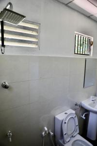 Koupelna v ubytování EECS Transit and Budget Homestay + 37 fotografií