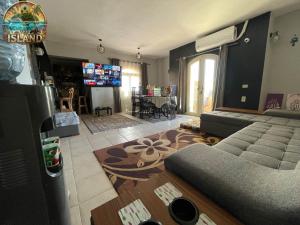 a living room with a couch and a table at The Island in Sharm El Sheikh