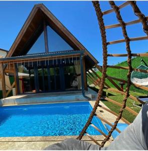 a swimming pool in front of a gazebo at MİNNA BUTİK EV in Sapanca +15 photos
