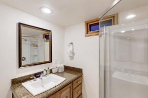 a bathroom with a sink and a shower at Telluride Lodge 324 in Telluride +21 photos
