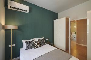 Posteľ alebo postele v izbe v ubytovaní Ma Maison Acropolis Mansion,3bdr Suite N6,400mbps