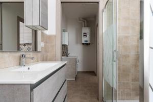 Koupelna v ubytování Famiglia 60MQ Giallo Milano Mxp Laghi