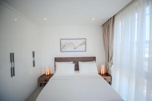 Ένα ή περισσότερα κρεβάτια σε δωμάτιο στο Modern Luxury Apartment in Nova by Devtraco- prime location and convenient 15mins from the airport