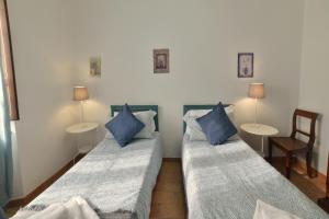 Postel nebo postele na pokoji v ubytování Borgo Faldo - Appartamento con Terrazzo - 117