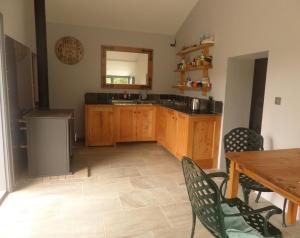 Nhà bếp/bếp nhỏ tại Rock Mount Cottage