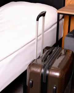 Letto o letti in una camera di Orion Hostel
