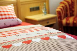 Postel nebo postele na pokoji v ubytování Landhotel Baumwipfel