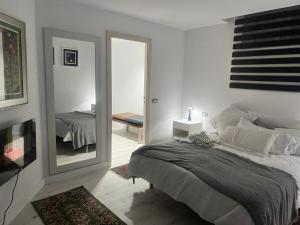 A bed or beds in a room at Loft la Matanza