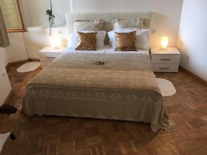 Tempat tidur dalam kamar di La Tana Dei Leoni Affittacamere