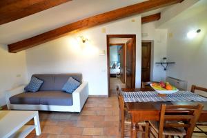 Posezení v ubytování Borgo Faldo - Bilocale con Cucina - 116